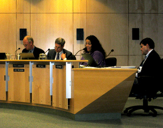 PHOTO CAPTION Seattle School Board member Mary Bass speaking during the meeting on reduction of force and other issues.