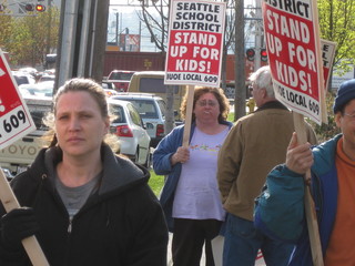 PHOTO CAPTION Union members picketing outside School Board office